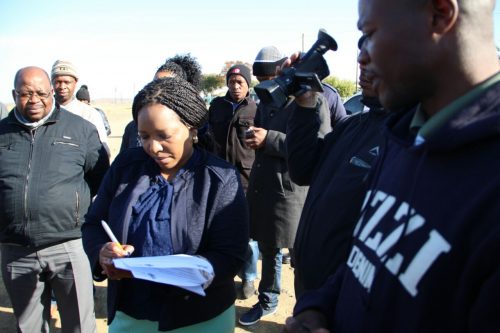 Botshabelo Magistrate's Court Manager, Sebe Makua, accepts and signs a memorandum from the Botshabelo Education Committee (BEDCOM). PHOTO: FACEBOOK.